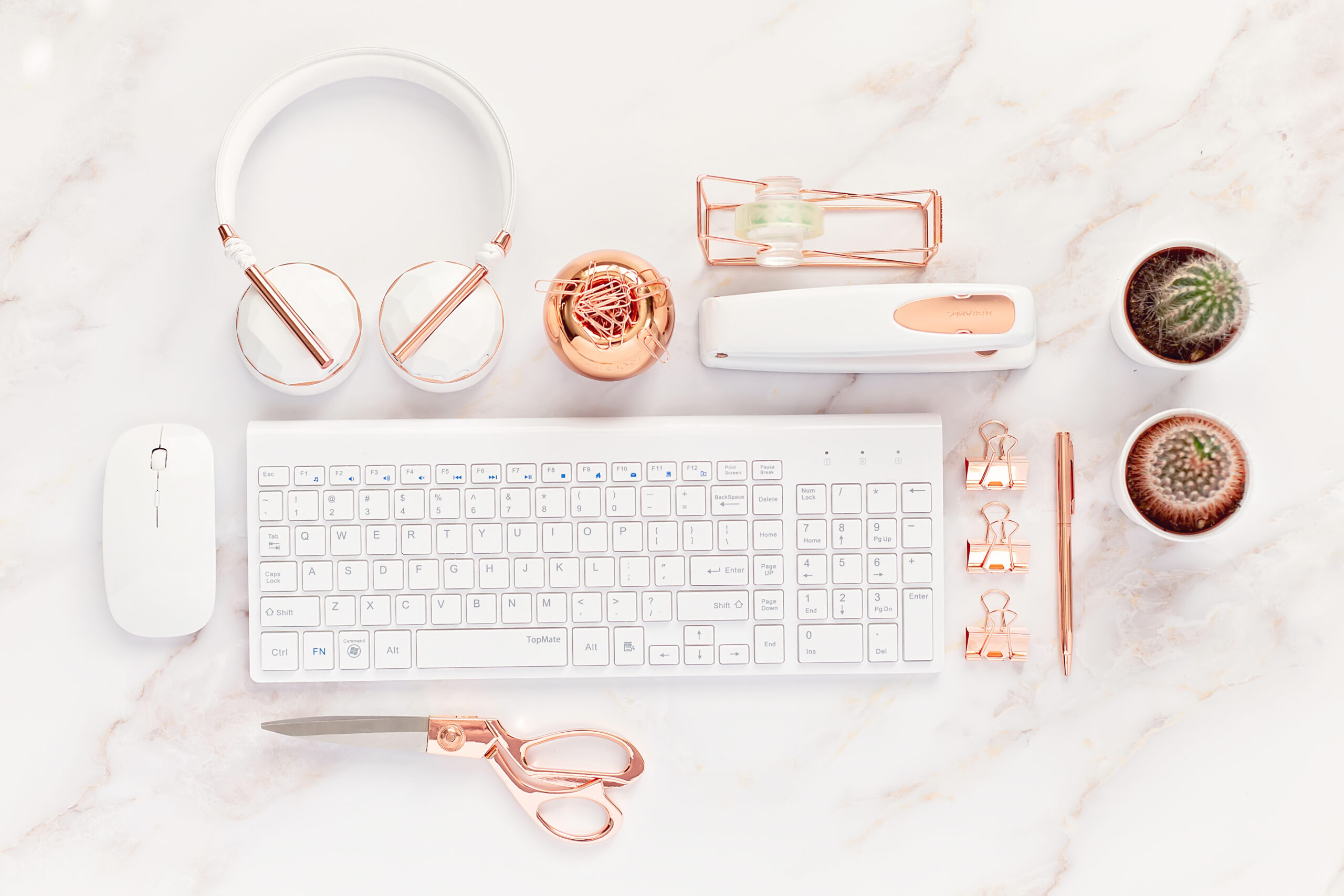 rose gold and white desk flatlay